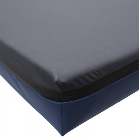 <h5 class="lightbox-heading">Non-slip base</h5><div class="d-none d-lg-block">A specially coated base fabric helps to prevent unwanted movement of the mattress and grip the stretcher surface without requiring mechanical fastenings. This allows quick access and fast cleaning of the patient surfaces.</div>